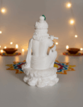 Lord Krishna playing flute in marble sculpture